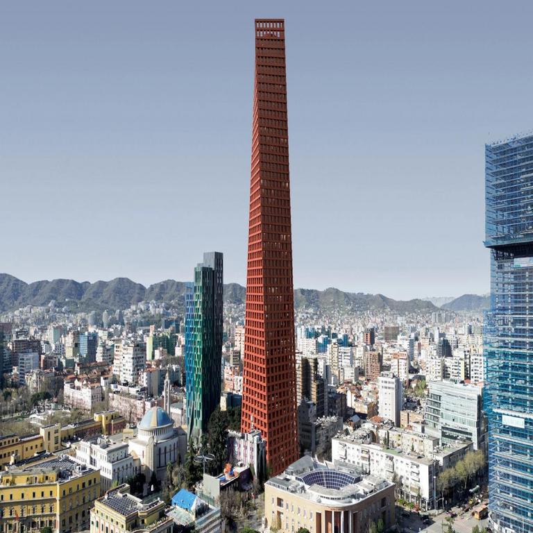 “Torre Barcelona: el asombroso edificio giratorio de España, construido en hormigón rojo y con una altura cercana a los 200 metros”