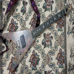 Ensamblaje de una guitarra de viaje a partir de componentes adquiridos en Aliexpress.